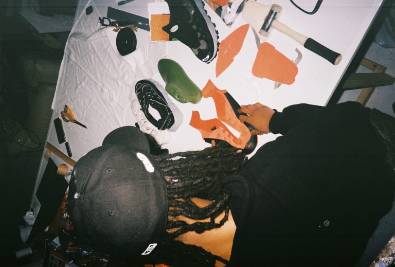 Meet Junior Clint, a footwear designer inspiring change in others